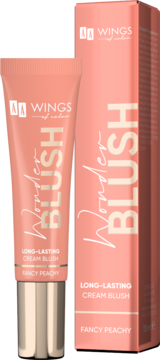 Długotrwały róż Wings of Color Wonder Blush, Fancy Peachy, w brzoskwiniowej tubce i pudełku stojących obok siebie.