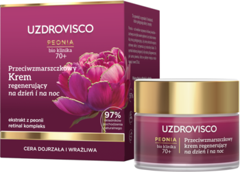 UZDROVISCO PEONIA Przeciwzmarszczkowy Krem regenerujący 70+ w fioletowym słoiczku i kartoniku z peonią.