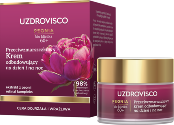 UZDROVISCO PEONIA krem 60+ przeciwzmarszczkowy. Fioletowe pudełko i otwarty słoiczek na dzień i noc.