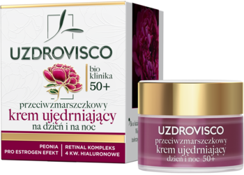 Krem Uzdrovisco Bio Klinika 50+ przeciwzmarszczkowy w purpurowym słoiczku ze złotą nakrętką, za nim białe pudełko.