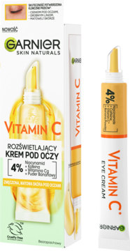 Garnier Vitamin C krem pod oczy 4% niacynamid, żółta tubka z aplikatorem obok zielono-białego pudełka.