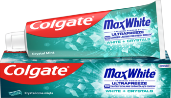Pasta Colgate Max White White + Crystals, turkusowa tubka i pudełko z miętą, widoczne białe kryształki, pod kątem.