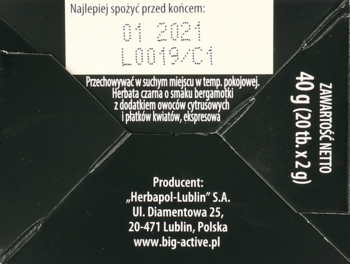 Tył czarnego opakowania herbaty Big-Active o smaku bergamotki, z datą ważności i danymi producenta.