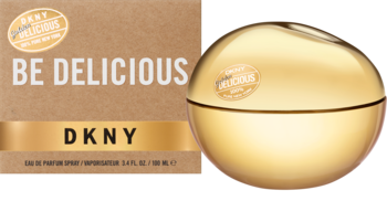 Złote perfumy DKNY Golden Delicious w butelce jabłku obok beżowego pudełka z napisem Be Delicious.