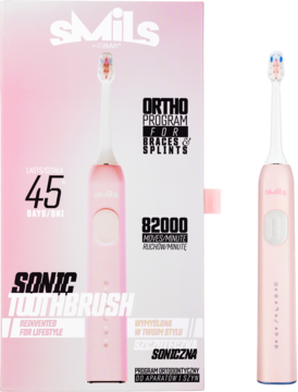 Różowa szczoteczka soniczna VITAMMY Smils w eleganckim pudełku i osobno, widok z przodu.