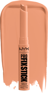 NYX Pro Fix Stick 04 dark peach, korygujący korektor w sztyfcie, kremowy, na tle smugi produktu.