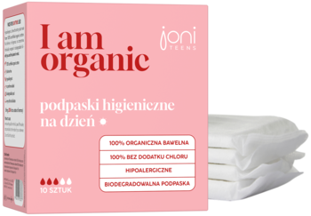 JONI TEENS I am organic podpaski na dzień w różowym pudełku, 100% bawełny organicznej. Z boku stos białych podpasek.