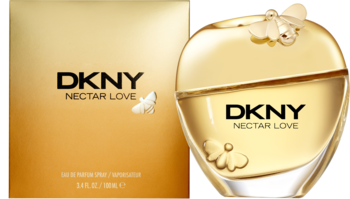 DKNY Nectar Love EDP: złota, owalna butelka z motylim detalem obok dopasowanego pudełka, widok z przodu.