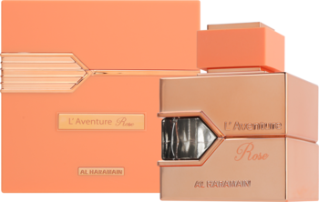 L'Aventure Rose Al Haramain, damska woda perfumowana w brzoskwiniowej butelce z okienkiem i pudełku, widok z przodu.
