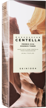 Skin1004 Madagascar Centella Probio-CICA, pudełko odżywczego toniku, beżowa etykieta na wzorze kanionu.