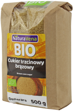 NaturaVena BIO cukier trzcinowy brązowy Demerara 500g w papierowej torbie, frontowy widok z widocznymi kryształkami.