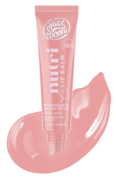 Różowy balsam do ust FaceBoom Nutri Cotton Candy, tubka z przodu na tle różowej smugi produktu.