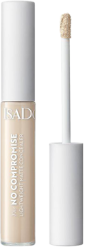 Beżowy korektor IsaDora No Compromise Matte w tubce, obok wyjęty aplikator z nałożonym produktem.