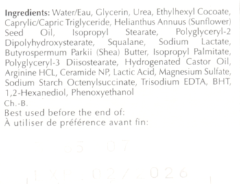 Tył kremu Eucerin UreaRepair, skupienie na białej etykiecie ze składnikami i datą ważności produktu.