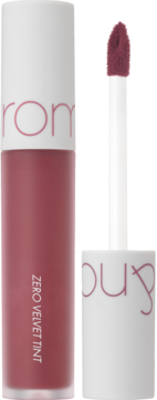 Rom&nd Zero Velvet Tint w odcieniu Burnt Heart. Matowa pomadka z ciemnoróżowym płynem i aplikatorem.