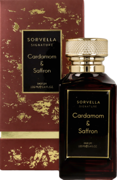 Perfumy Sorvella Signature Cardamom & Saffron w ciemnej butelce z złotą nakrętką, stojące przed otwartym, wzorzystym pudełkiem.