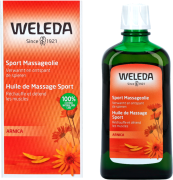 Weleda Sport Massage Oil z arniką: pomarańczowo-zielony karton i butelka, widok z przodu. Zawiera arnikę.