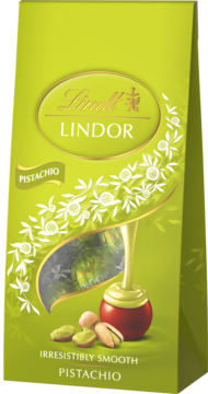 Zielona torebka Lindt Lindor Pistachio. Widoczne logo, ilustracja trufli z kremem i orzechami. Widok z przodu.