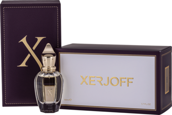 Woda perfumowana Xerjoff Shooting Stars NIO. Przezroczysta butelka z złotą nakrętką obok purpurowego pudełka ze złotym logo.