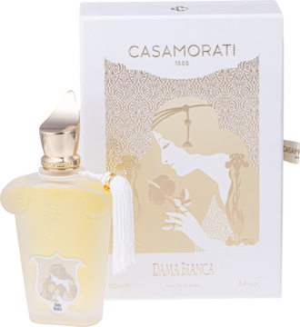 Elegancka butelka perfum Casamorati Dama Bianca z białym frędzlem i zdobionym pudełkiem, widok z przodu.