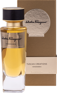 Salvatore Ferragamo Vendemmia EDP, złocisty płyn w przezroczystej butelce z czarnym korkiem, obok beżowe pudełko.
