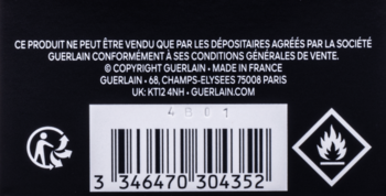Tył czarnego opakowania perfum Guerlain L'Homme Ideal Extreme, z białym kodem kreskowym, ikonami recyklingu i ognia.