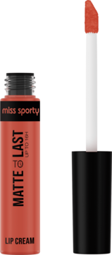 Miss Sporty Matte To Last 16h Lip Cream, odcień Peachy. Otwarta tubka z aplikatorem, koralowy kolor, matowe wykończenie.