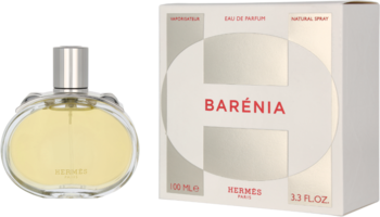 Hermes Barénia Eau de Parfum: złocista butelka z srebrnym korkiem obok białego kartonowego opakowania.