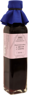 Syrop porzeczkowy z imbirem i limonką Manufaktura Cieleśnica w kwadratowej butelce z różową etykietą i niebieskim kapturkiem.