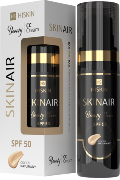 Hiskin SKINair CC Cream SPF 50 w czarnej butelce z pompką i złotymi akcentami, obok biało-złotego pudełka, przód. Odcień Naturalny.