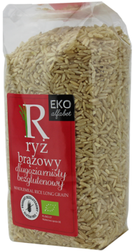 Transparentna torba ryżu brązowego długoziarnistego Eko Alfabet, z czerwoną etykietą i logo bezglutenowym.