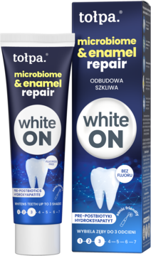 Tołpa White ON pasta do zębów microbiome & enamel repair, bez fluoru, wybielająca, tuba i pudełko obok siebie.