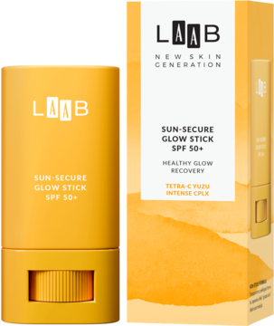 Żółty sztyft LAAB Sun-Secure Glow SPF 50+ z Tetra-C Yuzu oraz pudełko, widok z przodu. Daje efekt rozświetlonej skóry.