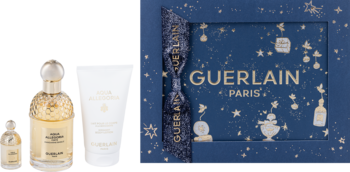 Zestaw Guerlain Aqua Allegoria Forte Mandarine Basilic: perfumy, miniatura i balsam obok niebieskiego pudełka.