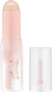 Otwarty, matujący podkład w sztyfcie Essence Foundation Stick, jasny beż, z widoczną szminką i nakrętką obok.