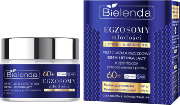 Bielenda Egzosomy młodości 60+ liftingujący krem redukujący przebarwienia, w białym słoiczku i granatowym pudełku.