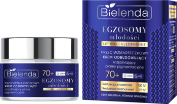 Krem Bielenda Egzosomy młodości 70+ na zmarszczki i przebarwienia, w białym słoiczku obok granatowego pudełka.