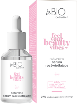 Serum rozświetlające beBIO Feel Your Beauty Vibes z wit. C w białej butelce z kroplomierzem, obok różowe opakowanie.