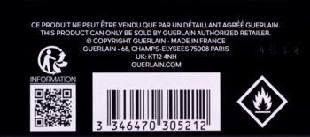 Tył opakowania perfum Guerlain Habit Rouge. Widoczne informacje, kod kreskowy 3346470305212, QR i symbol płomienia.