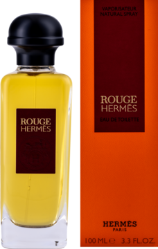 Rouge Hermès woda toaletowa damska, złota butelka z czarną nakrętką obok pomarańczowego opakowania, widok z przodu.