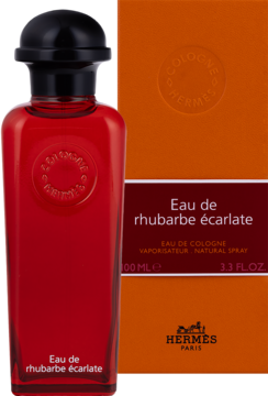 Hermès Eau de Rhubarbe Ecarlate, czerwona butelka 100ml i pomarańczowe pudełko na wodę kolońską, widok z przodu.
