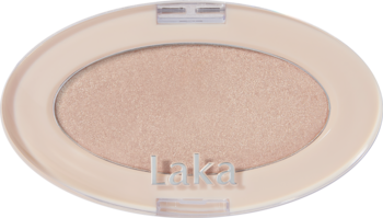 Wegański rozświetlacz Laka DreamBeam Natural Beam, jasny puder w owalnym, otwartym opakowaniu.