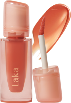 Żelowy błyszczyk LAKA Jelling Nude Tangerine Ring: otwarta buteleczka, aplikator i smuga pomarańczowo-brzoskwiniowego błyszczyka.