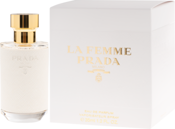 Damska woda perfumowana Prada La Femme. Biała butelka ze złotym korkiem, obok białe opakowanie z napisem.
