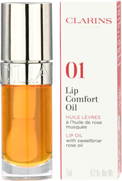Clarins Lip Comfort Oil 01 Honey: butelka z złotym olejkiem i białe pudełko z detalami. Widok z przodu.
