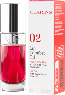 Clarins Lip Comfort Oil 02 Raspberry, olejek do ust w butelce z srebrnym korkiem i czerwonym pudełkiem.
