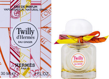 Hermès Twilly d'Hermès Eau Ginger damska woda perfumowana. Butelka z białą nakrętką-kapeluszem i wstążką.