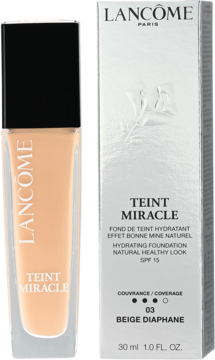 Lancôme Teint Miracle SPF 15 Beige Diaphane, nawilżający podkład w jasnej szklanej butelce obok pudełka.