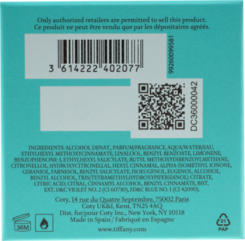 Tył opakowania damskiej wody perfumowanej Tiffany & Co. na jasnoniebieskim tle, z widocznym składem, kodem kreskowym i ikonami.
