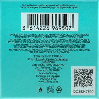 Jasnoniebieski tył opakowania wody toaletowej Tiffany & Co. Sheer, z kodem kreskowym i pełnym składem.